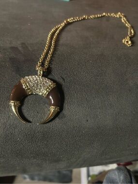 Gold-Tone Brown Crescent Horn Necklace with Crystal Accent